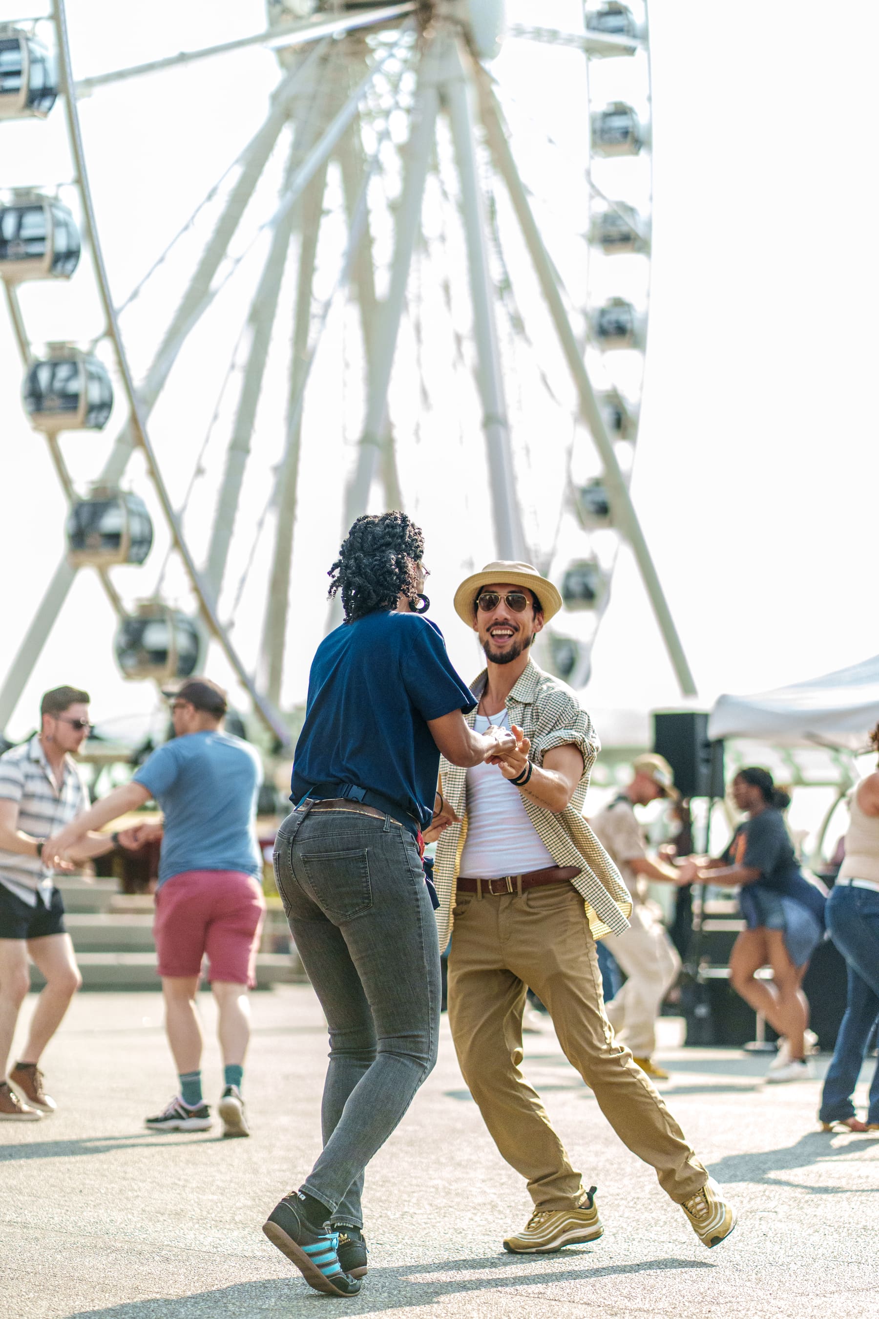 Partners dancing Hustle at an ROTP event